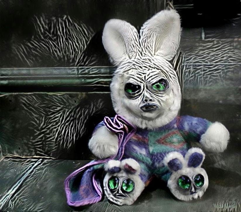 One of my WTF Creatures- Zoe Bunny. I cut the face out of a stuffed bunny & cut his feets, sculpted faces w/eyeballs I made & painted them up. Then I slapped them into the stuffed bunny's head and feets and BAM! We have a WTF Creature!