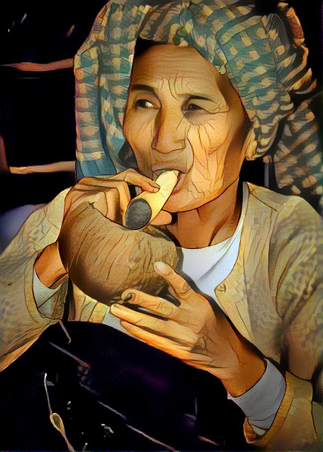 Old woman smoking a cigar