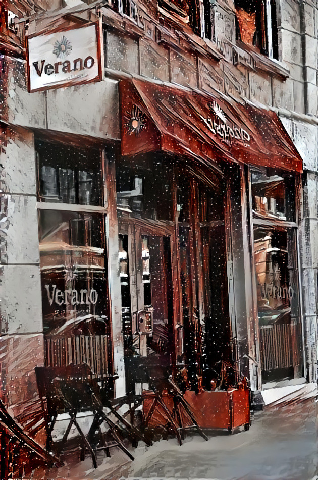 Snow falling outside the cafe