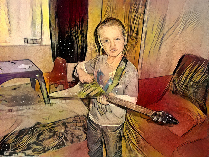 Boy with Flying V guitar