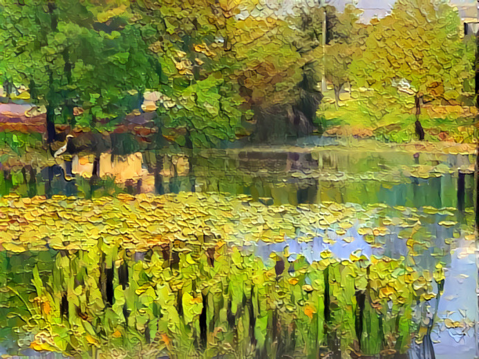 Dappled park pond with egret