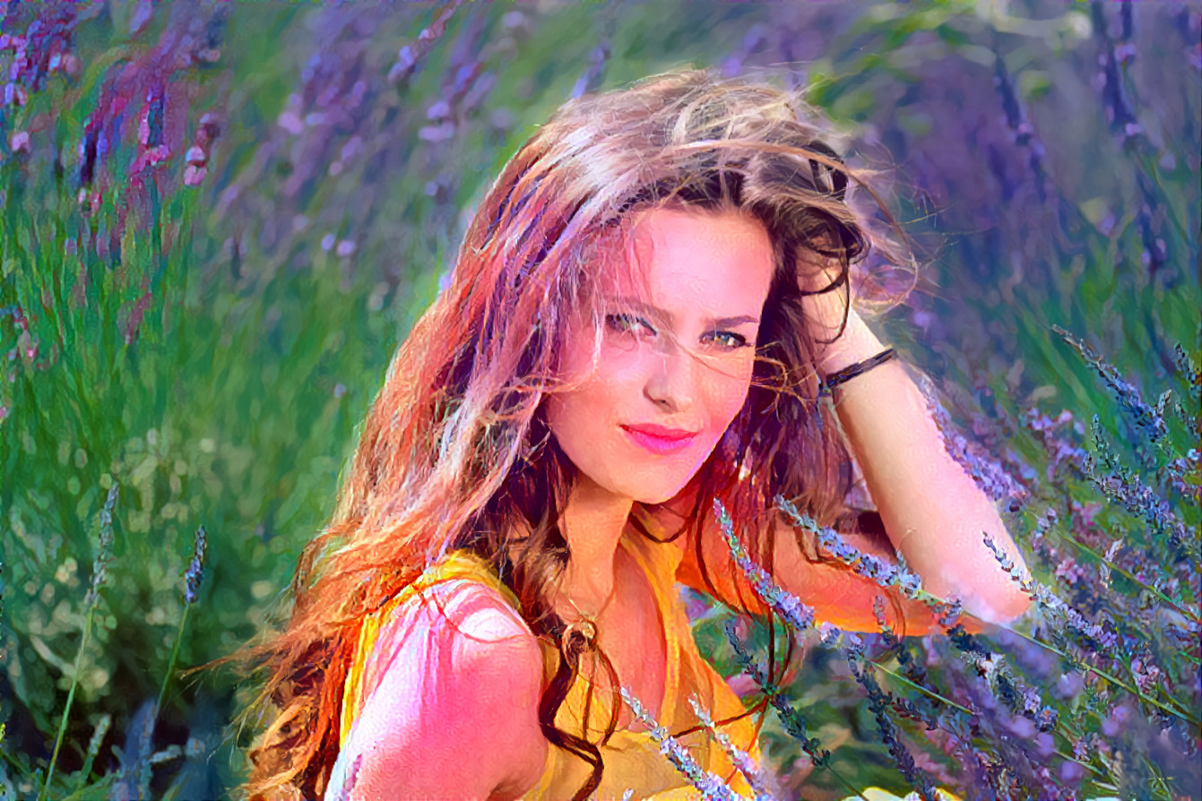 Portrait of a young woman with lavender flowers